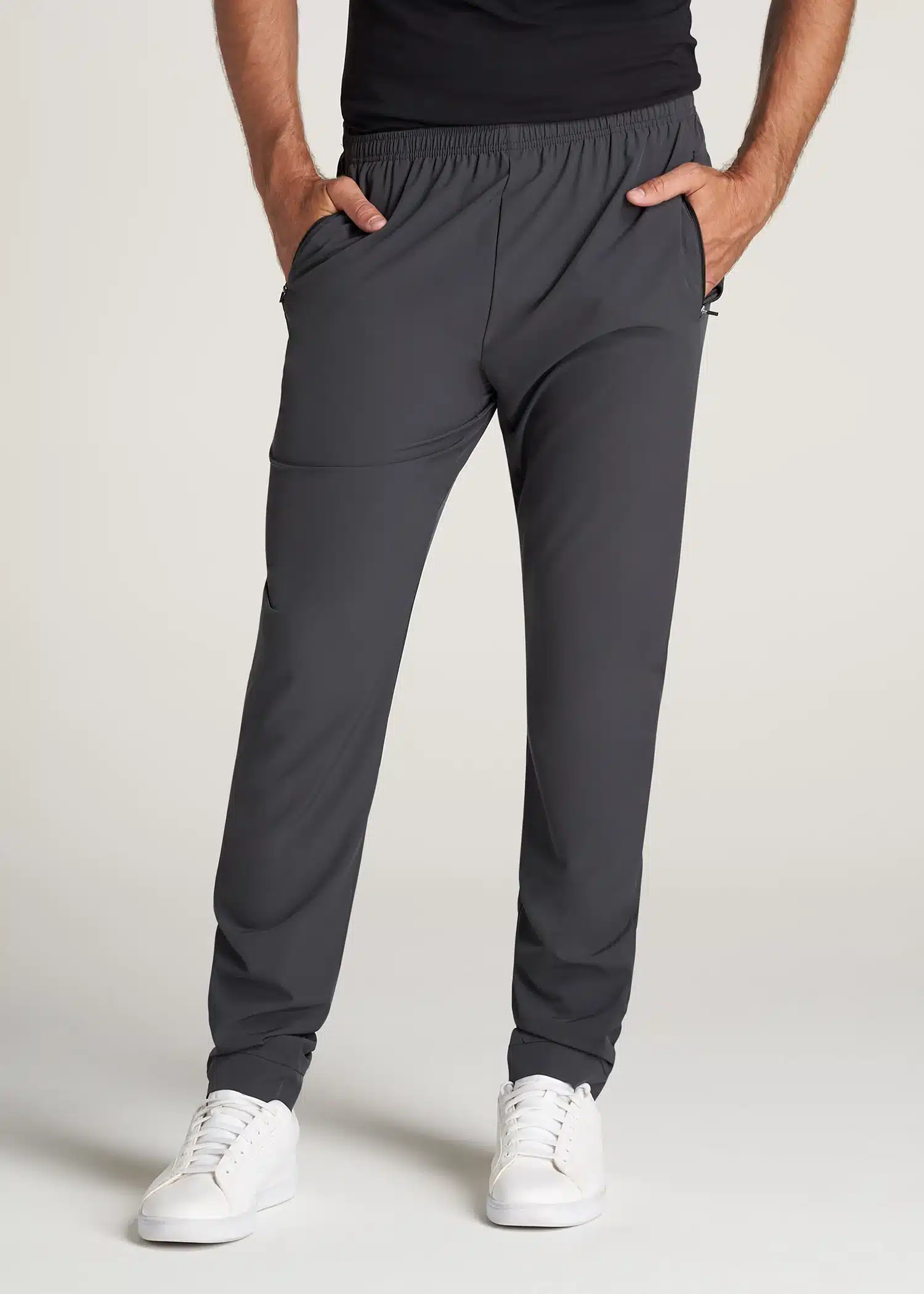 American Tall: MEN'S TALL TAPERED-FIT LIGHT-WEIGHT ATHLETIC PANTS |  CHARCOAL *Model measures: 6'7, 220 lbs*